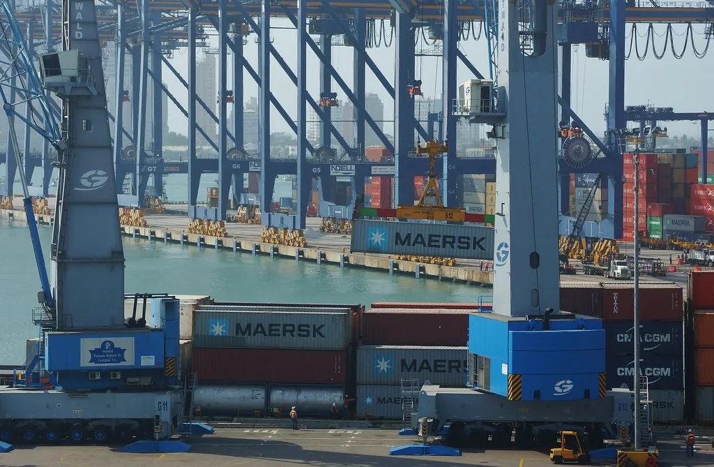 Container terminal with a gantry crane loading shipping containers