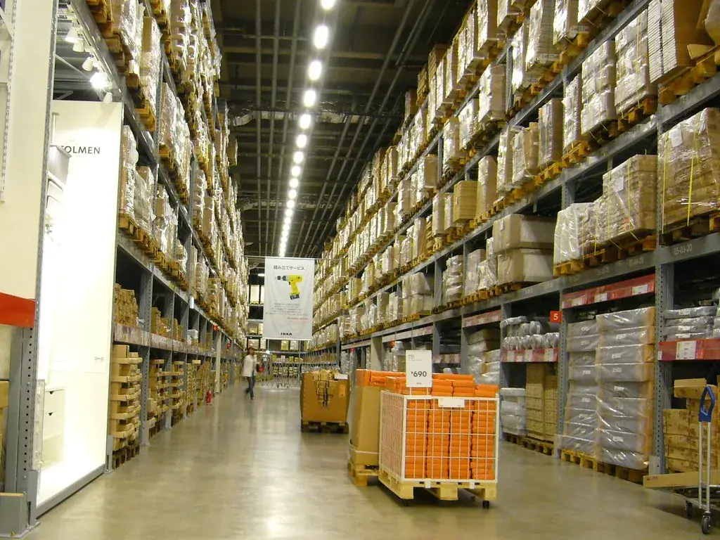 Long warehouse aisle lined with pallet racking