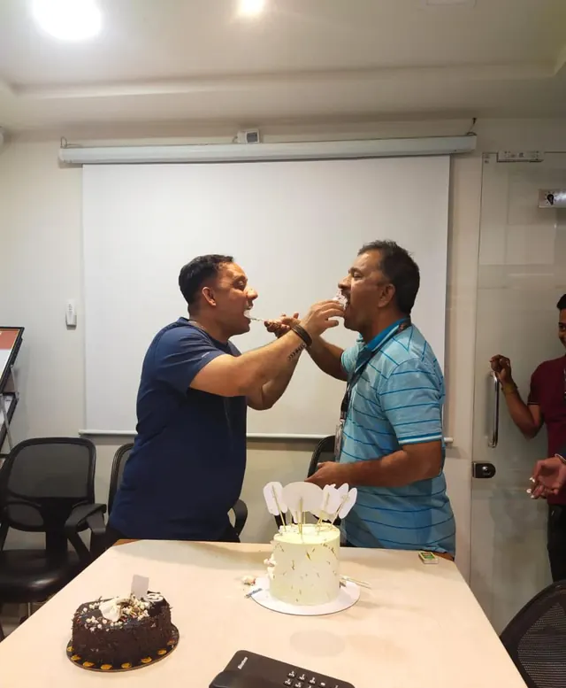 Sharing cake at a team celebration