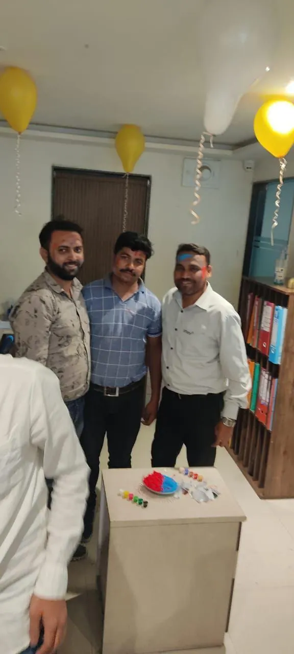 Colleagues celebrating Holi together