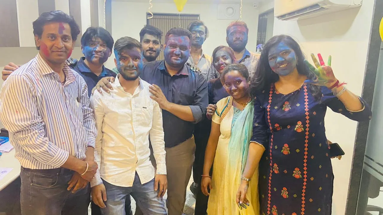Holi at the office: the whole team in colour