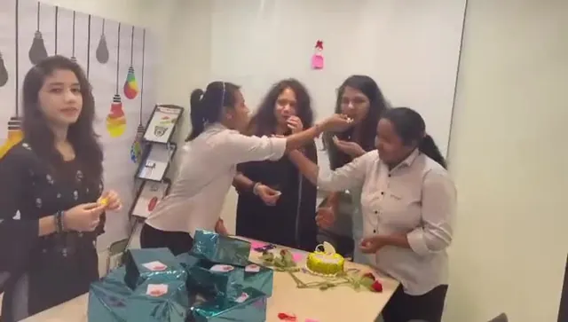 Sharing cake on Women's Day